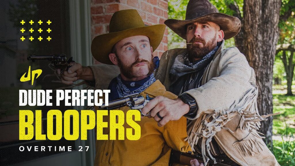 Two men dressed as cowboys, one in a yellow outfit and one in a fringe jacket, are playfully posing with toy guns. The background shows a brick wall and greenery. Text reads "Dude Perfect Bloopers Overtime 27.