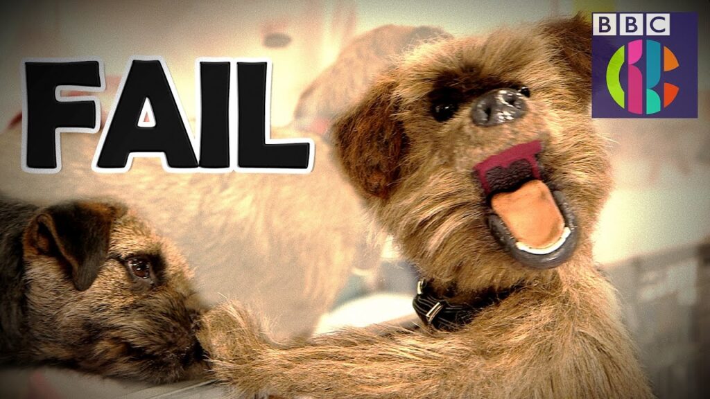 A puppet dog with an open mouth and wide eyes appears on the right side, with the word "FAIL" in bold black letters on the left. The BBC logo is in the top right corner.